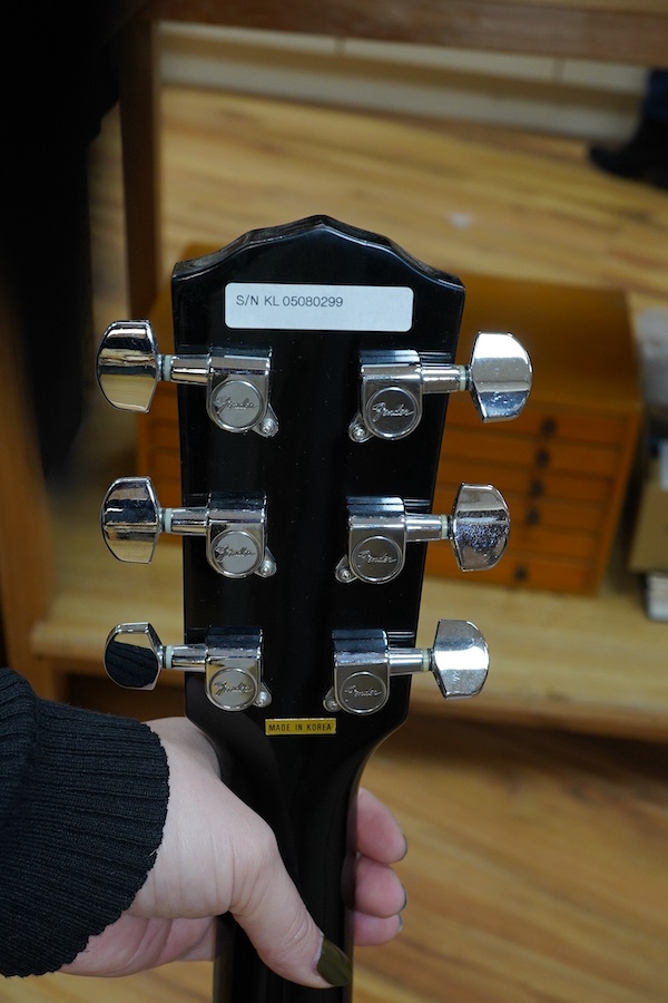 A Fender Resonator acoustic guitar. Condition - good.